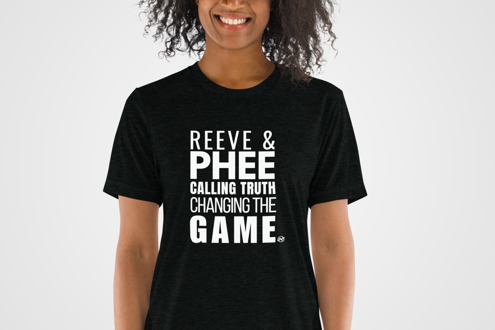 A black unisex T-shirt with bold white lettering that reads “REEVE & PHEE: CALLING TRUTH, CHANGING THE GAME.” Designed by No Assumptions Apparel, this shirt stands in solidarity with WNBA coach Cheryl Reeve and player Napheesa Collier, honoring women who speak truth to power and challenge injustice in sports leadership. The design embodies strength, equity, and activism — merging sport and social justice into a wearable statement.