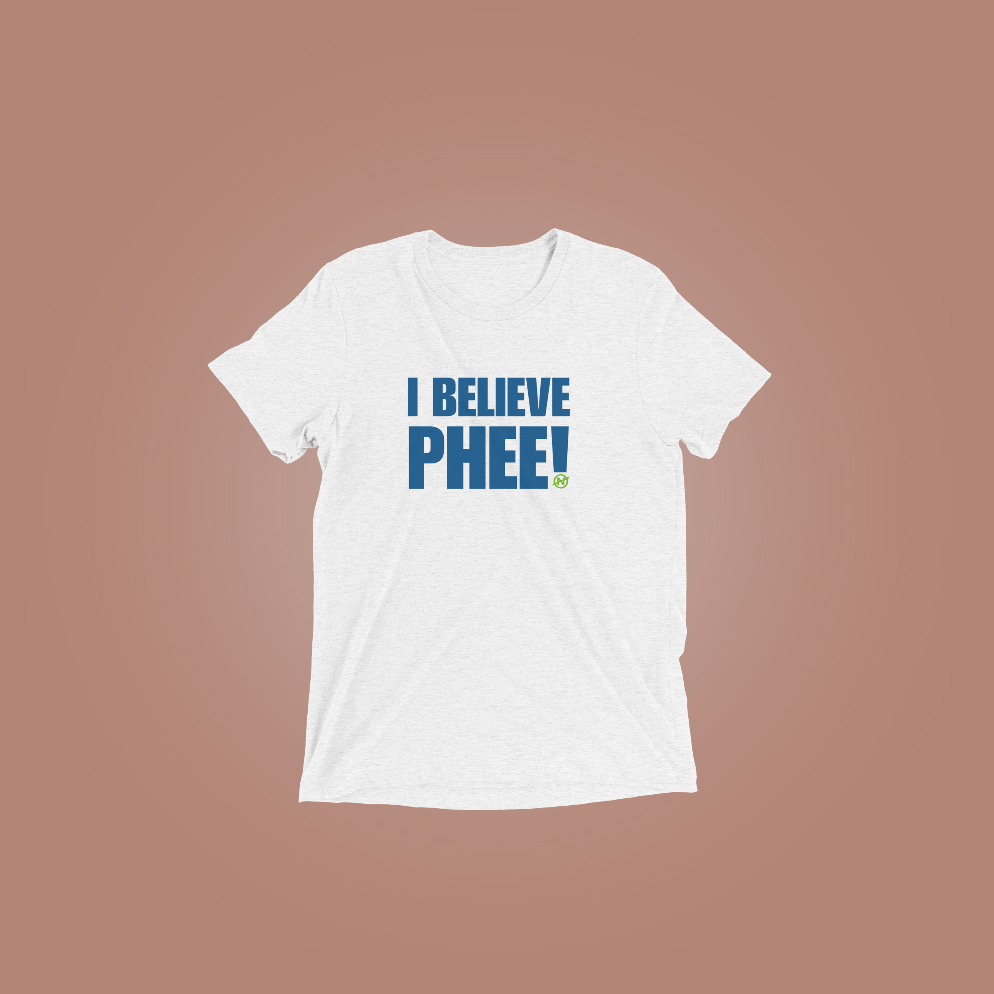 A white heathered unisex T-shirt featuring the bold blue statement text “I BELIEVE PHEE!” centered on the front. The shirt represents solidarity with WNBA player Napheesa Collier and women athletes speaking truth to power. Designed by No Assumptions Apparel, it stands for gender equity, justice, and accountability in women’s sports. The minimalist design makes a strong visual statement about believing women, amplifying voices, and calling for fairness and reform within the WNBA and beyond.