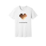 A white unisex, crew-neck t-shirt in solid black.  The central graphic on the chest is a large pixelated heart composed of blurred squares in varying skin-tone shades. Below the heart, the word "community" is printed in lowercase letters. The font alternates between bold and light weights, highlighting the letters "unity."