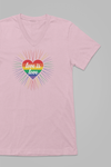 A pink V-neck unisex t-shirt featuring a design of a vibrant rainbow-striped heart at the center with the text "love is love" written inside. Around the heart colorful, radiating lines, with sunburst effect emphasizing inclusivity and love for all.
