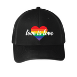 A black unisex snapback trucker hat featuring a bold rainbow heart design on the front. The heart is filled with horizontal rainbow stripes, and the words "love is love" are written in elegant white script across it, symbolizing support for LGBTQIA2S+ equality and inclusivity.