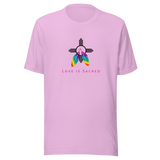 A lilac crew neck unisex t-shirt featuring a design centered around the Zia symbol, representing the sun with four rays. 

At the symbols center, begins two colorful PRIDE rainbow feathers, hanging over the symbol creating a love and spirituality vibrancy accent.

Below the design, "LOVE IS SACRED" text displayed in pink bold lettering.