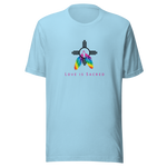 An ocean blue crew neck unisex t-shirt featuring a design centered around the Zia symbol, representing the sun with four rays. 

At the symbols center, begins two colorful PRIDE rainbow feathers, hanging over the symbol creating a love and spirituality vibrancy accent.

Below the design, "LOVE IS SACRED" text displayed in pink bold lettering.