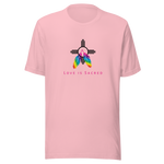 A pink crew neck unisex t-shirt featuring a design centered around the Zia symbol, representing the sun with four rays. 

At the symbols center, begins two colorful PRIDE rainbow feathers, hanging over the symbol creating a love and spirituality vibrancy accent.

Below the design, "LOVE IS SACRED" text displayed in pink bold lettering.