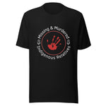 This is a black, crew-neck, short-sleeve, unisex-style t-shirt designed to raise awareness for Missing and Murdered Indigenous Relatives (MMIR). Centered on the front is a striking circular design with a powerful message and symbolic imagery.